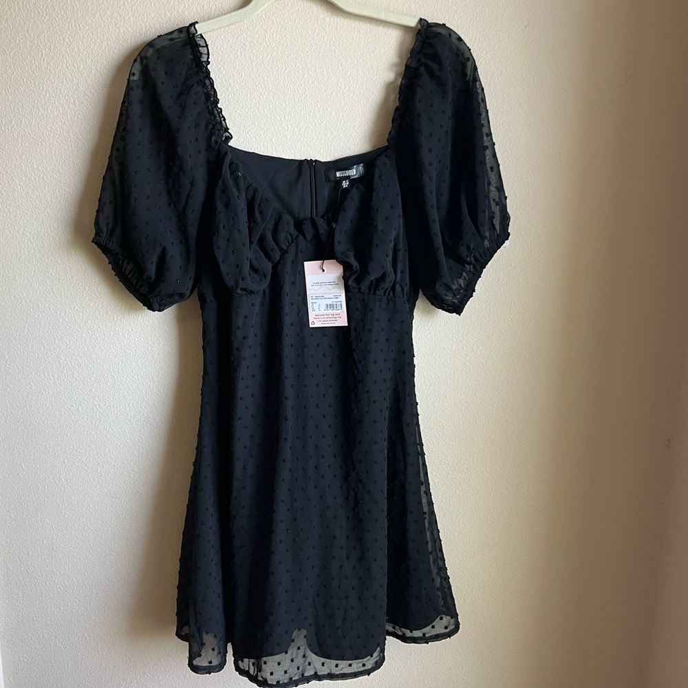 Missguided puffy sleeve mini dress. Still has tags/never worn. Size 8